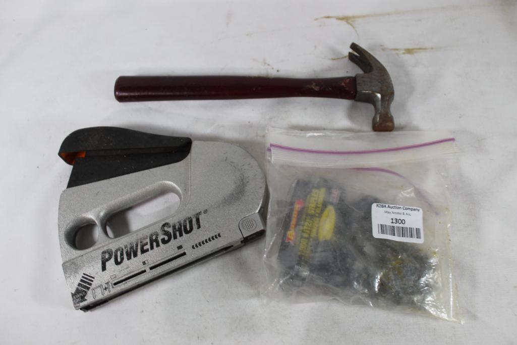 One PowerShot stapler with staples and one 12 Oz claw hammer. Used.