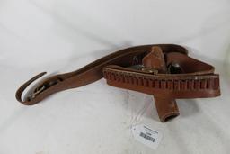 Leather ammo belt and leather right handed snap revolver holster for 3". Used