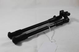 One adjustable rail mount bipod. 10 to 14". Looks unused.