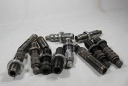 Thirteen assorted Lee reloading dies. Used, rusty.