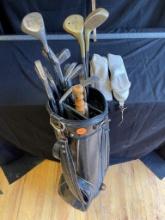 Golf Clubs in Black Bag