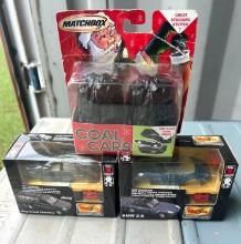 2 Maisto Motorized Cars and 1 Matchbox Coal Car