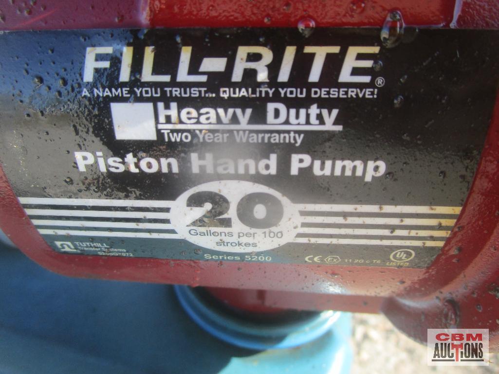 Fill Rite Piston Hand Pump On Blue Barrel