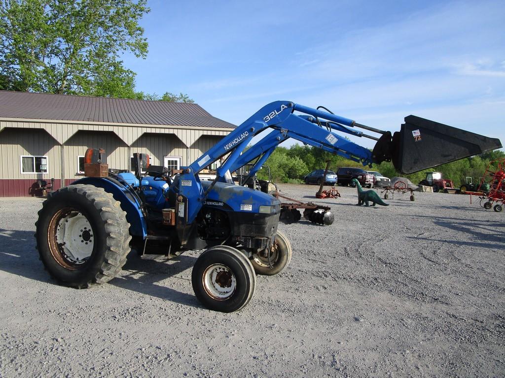 NEW HOLLAND TN 70 W LOADER