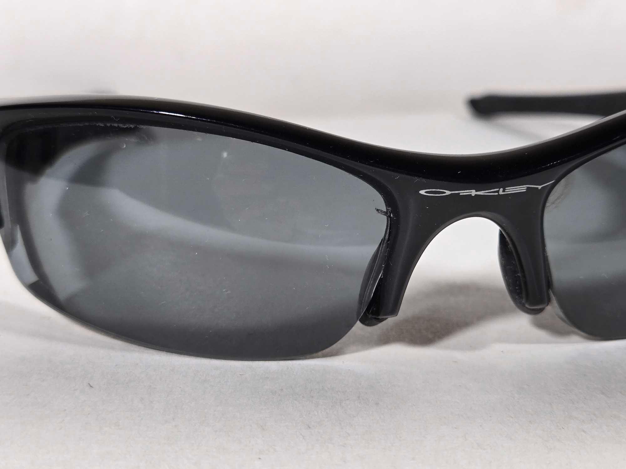 4 Pair of Pre-Owned Men's Sunglasses Incl. Oakley, Armani, & Timberland