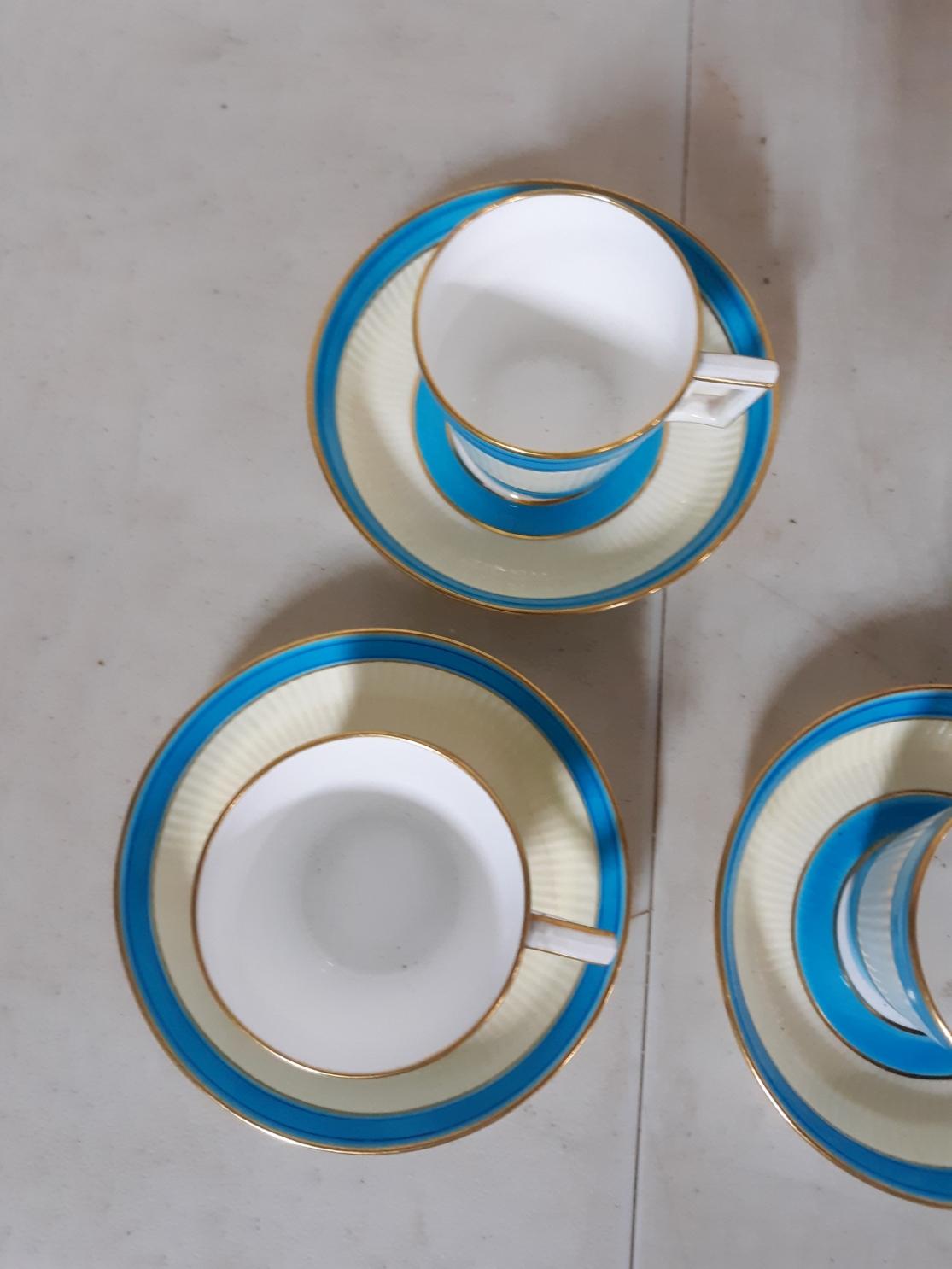 Blue & White Lusterware Cups and Saucers