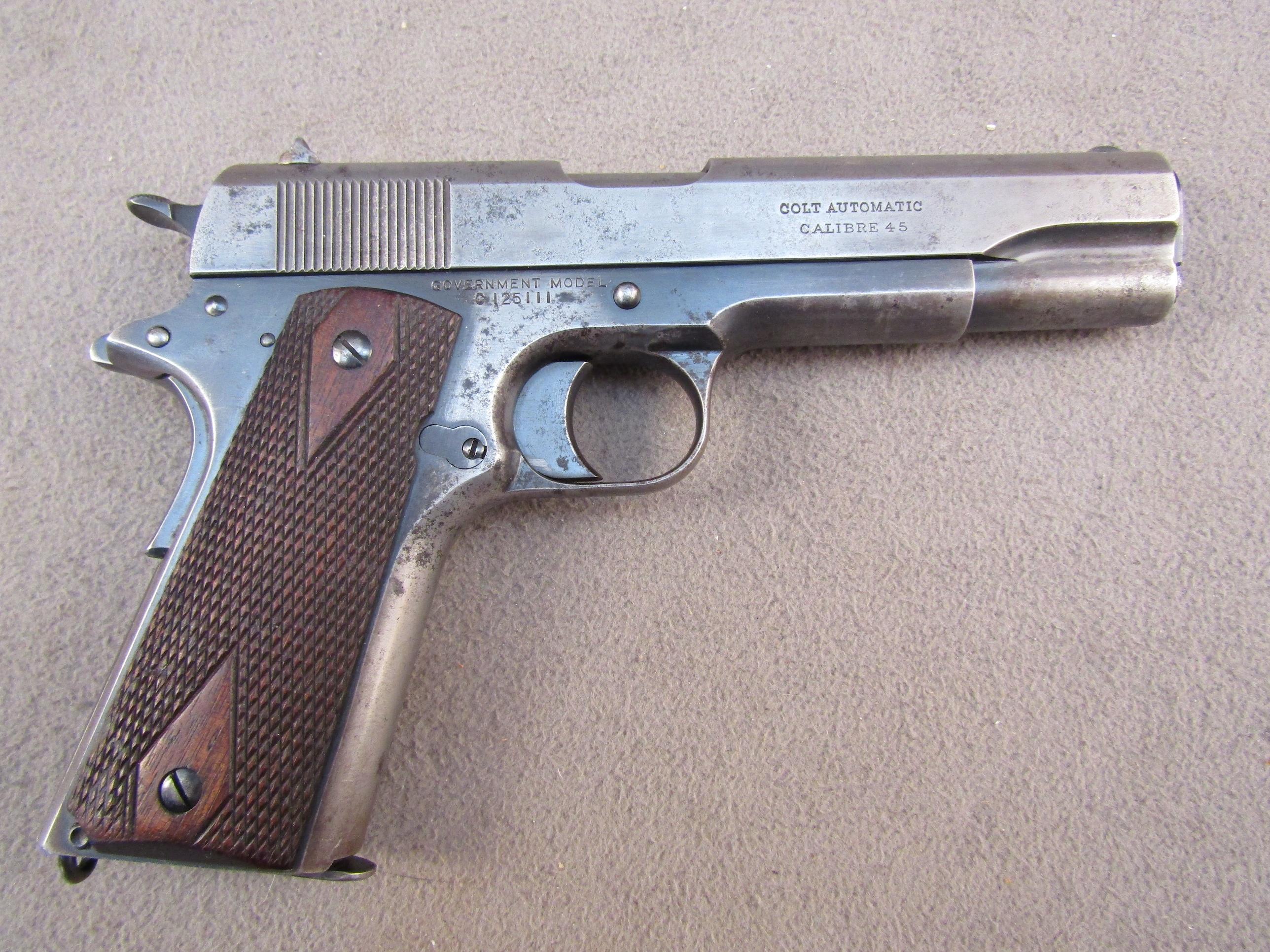 handgun: COLT Model Government, Semi-Auto Pistol, .45, 6 shot, 5" barrel, S#C125111