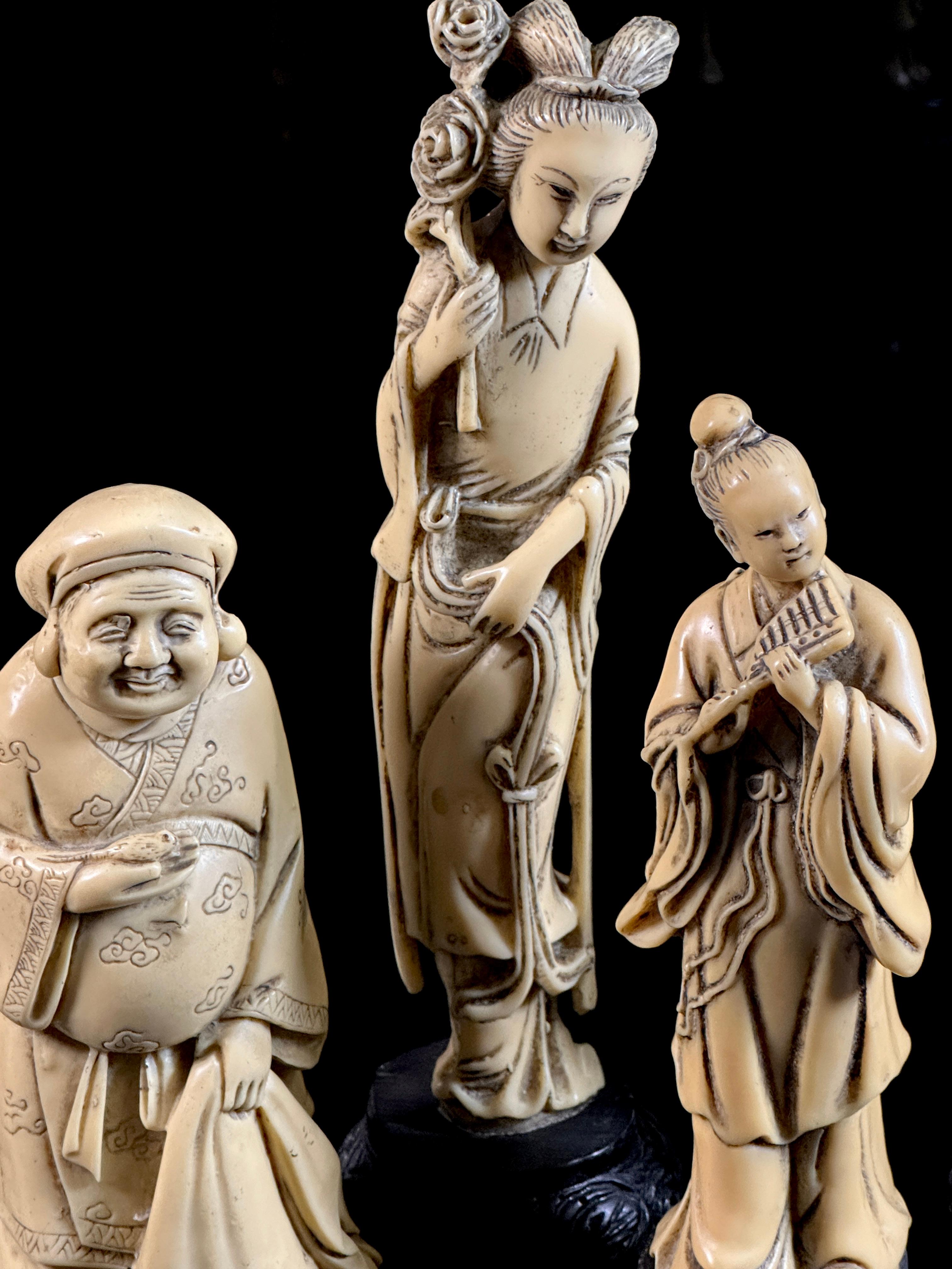 Four Asian Carved Figures