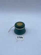 small green avon bottle