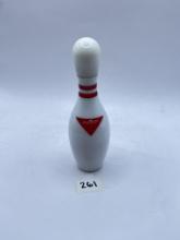 bowling pin with some liquid avon bottle