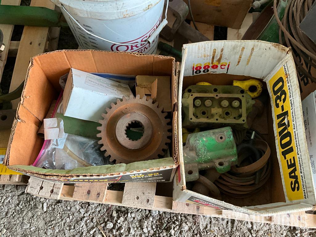 Pallet of John Deere 2 cylinder parts