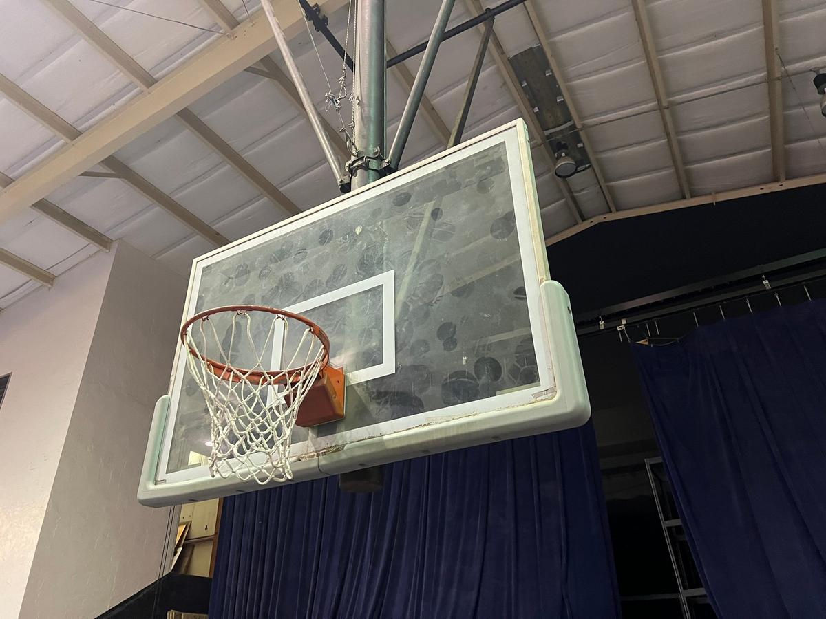 GYMNASIUM BASKETBALL HOOPS (GLASS BACKBOARDS) WITH HOISTS - (LOCATED DAVIE,