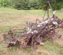 John Deere cultivater with trac plow and misc. feet