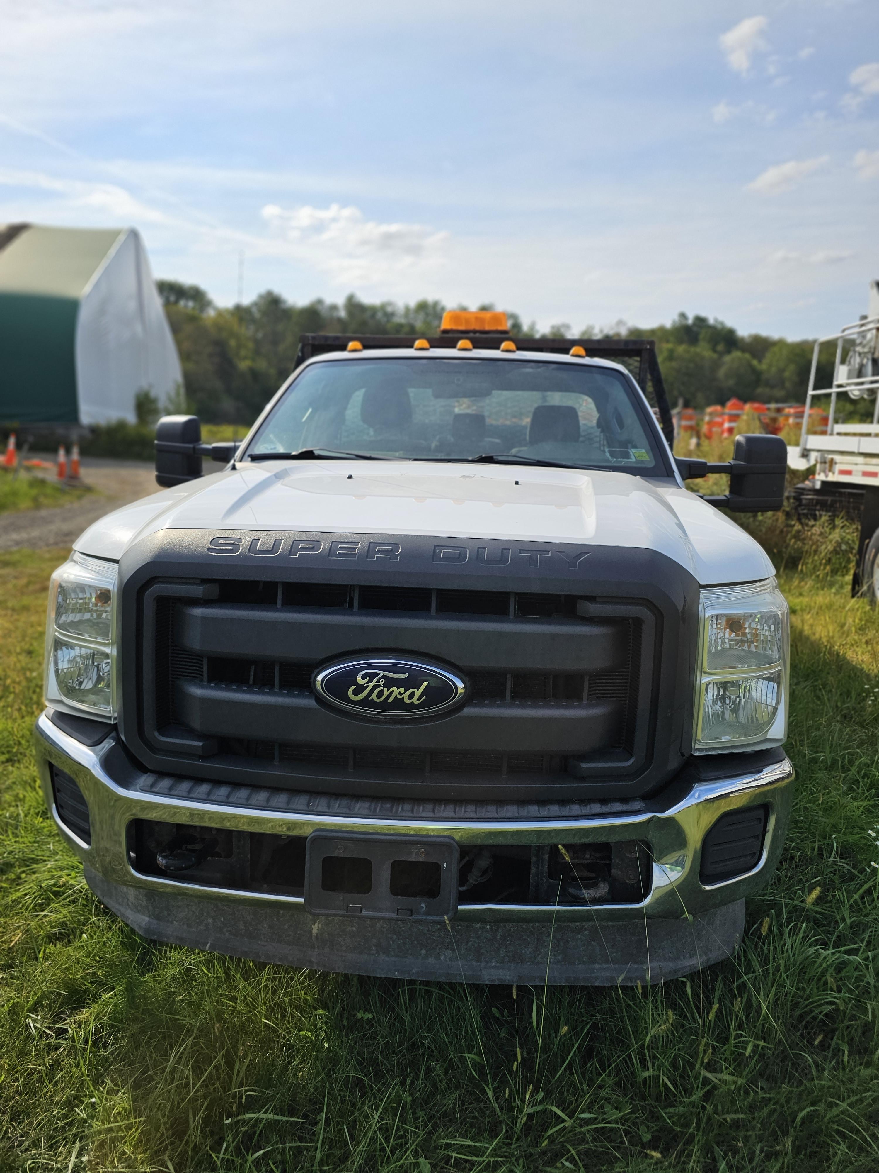 10364 – 2012 Ford F350 4x4 Flat Bed 240k – W1155