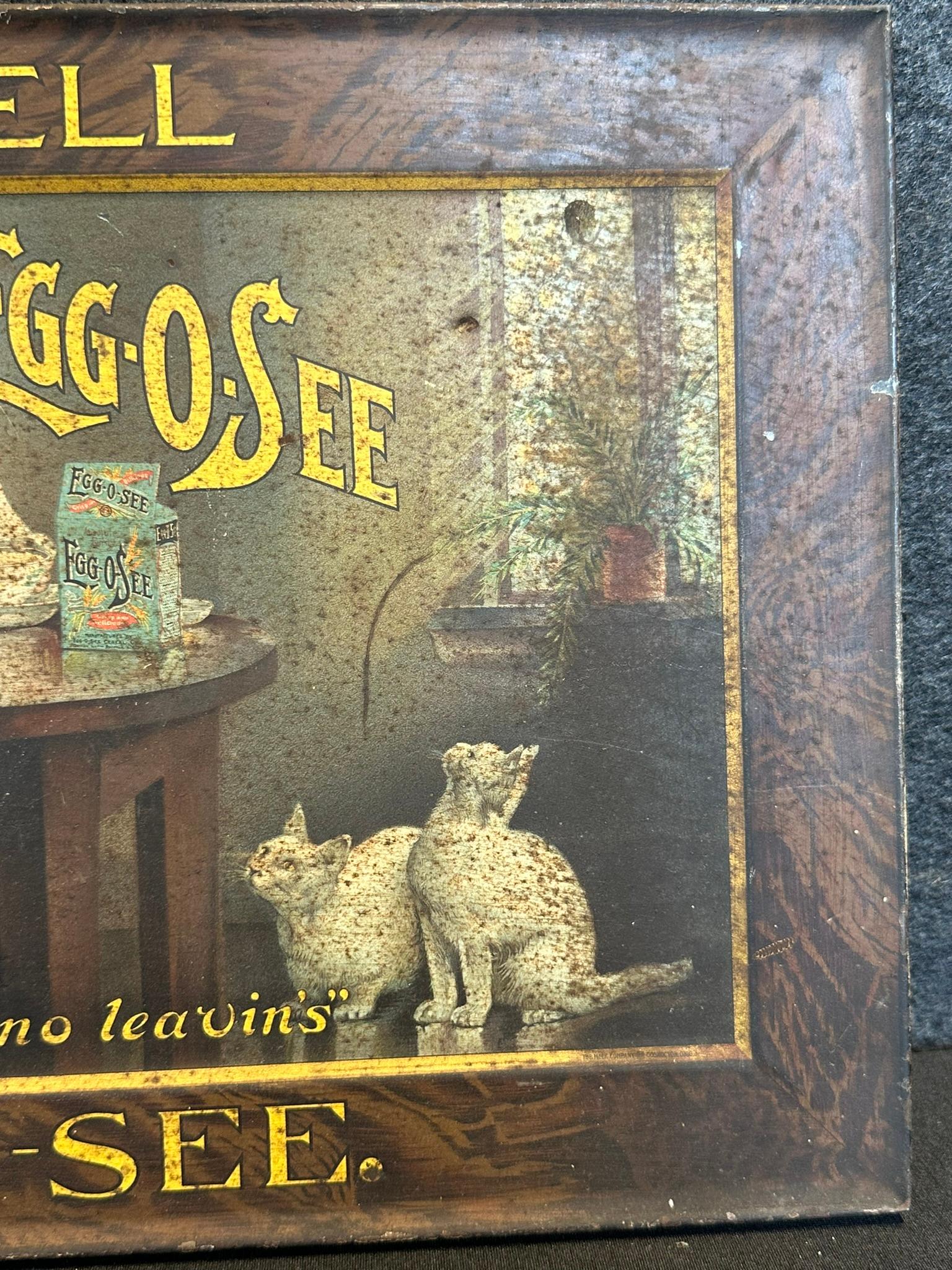 We Sell Egg-O-See Tin Litho Wood Grain Advertising Sign Circa. 1910s