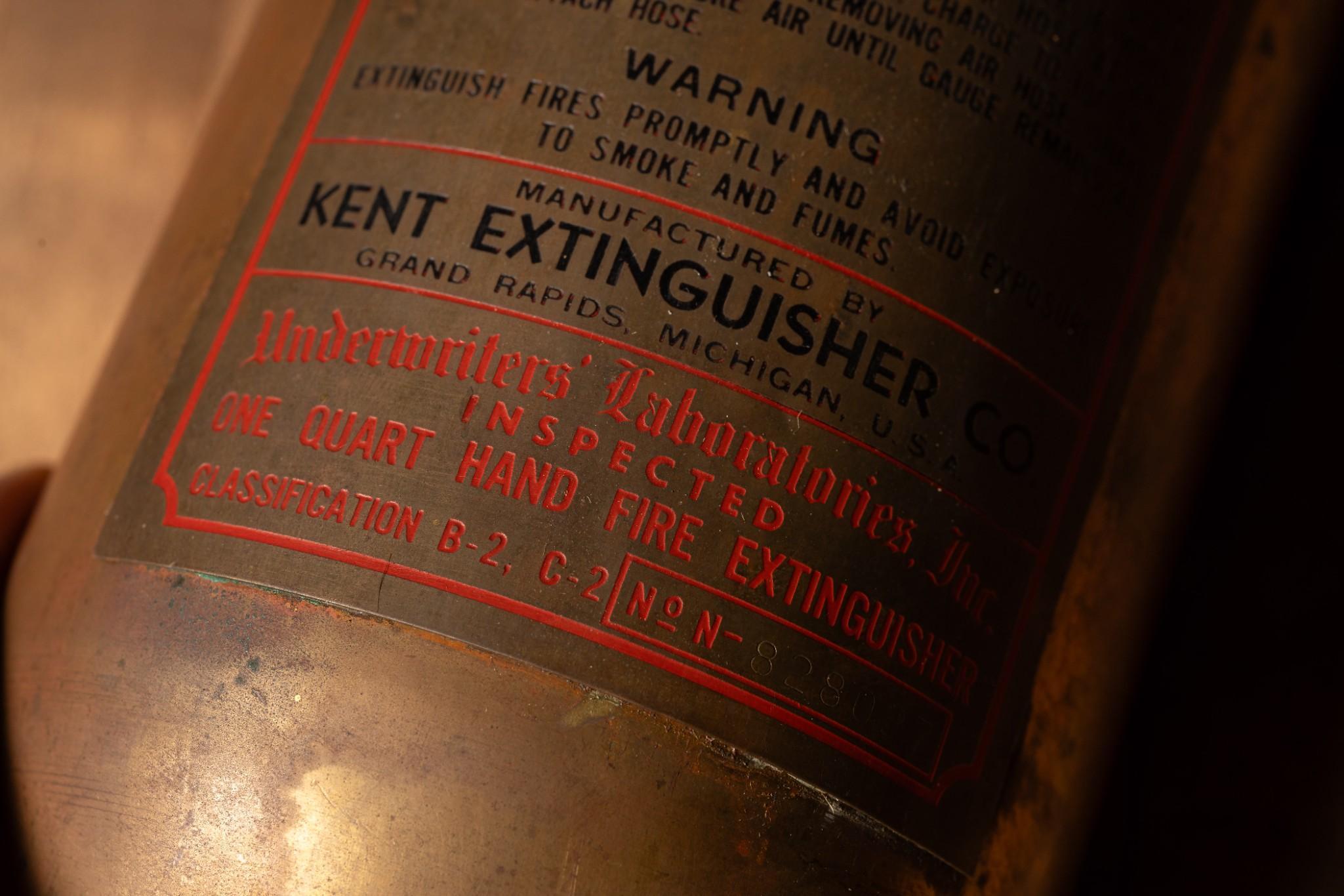 Antique Fire Extinguisher by Kent