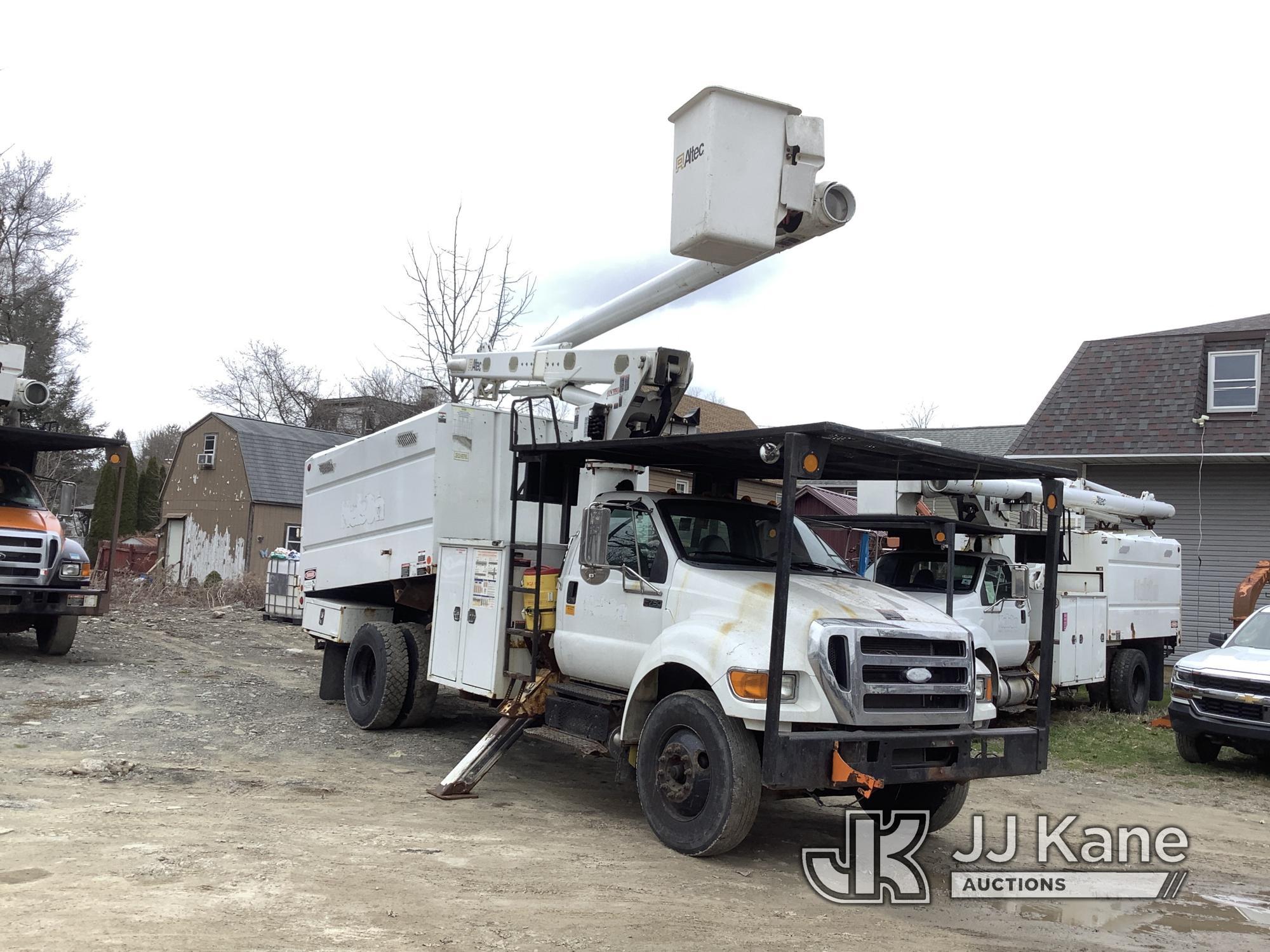 (Deposit, NY) Altec LR756, Over-Center Bucket Truck mounted behind cab on 2015 Ford F750 Chipper Dum