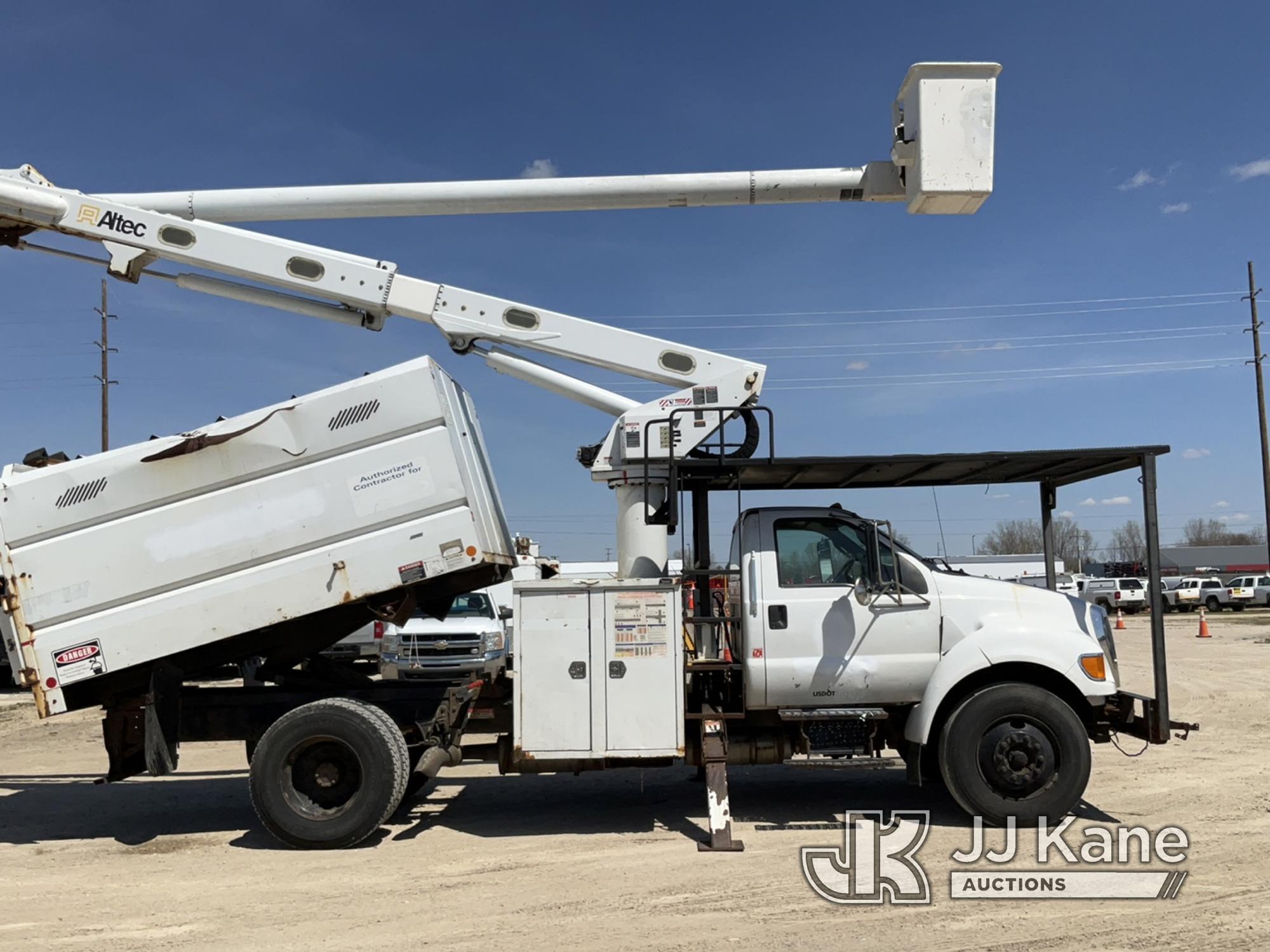 (Charlotte, MI) Altec LR756, Over-Center Bucket Truck mounted behind cab on 2013 Ford F750 Chipper D