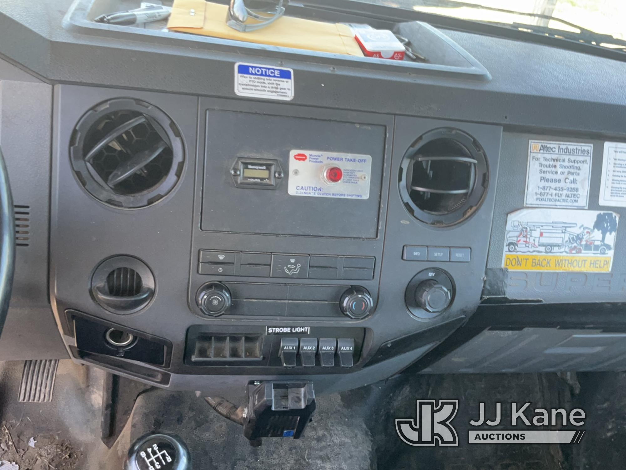 (Charlotte, MI) Altec LR756, Over-Center Bucket Truck mounted behind cab on 2013 Ford F750 Chipper D