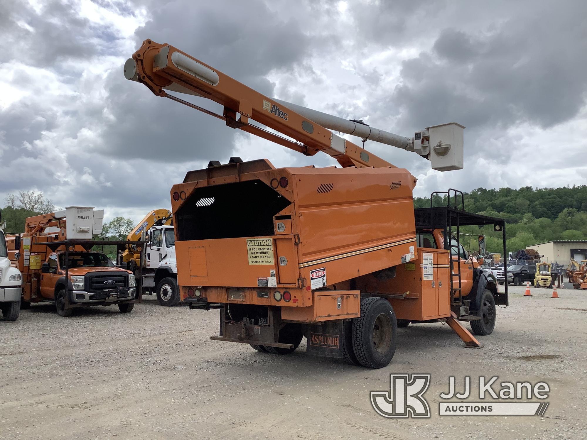 (Smock, PA) Altec LRV55, Over-Center Bucket Truck mounted behind cab on 2010 Ford F750 Chipper Dump