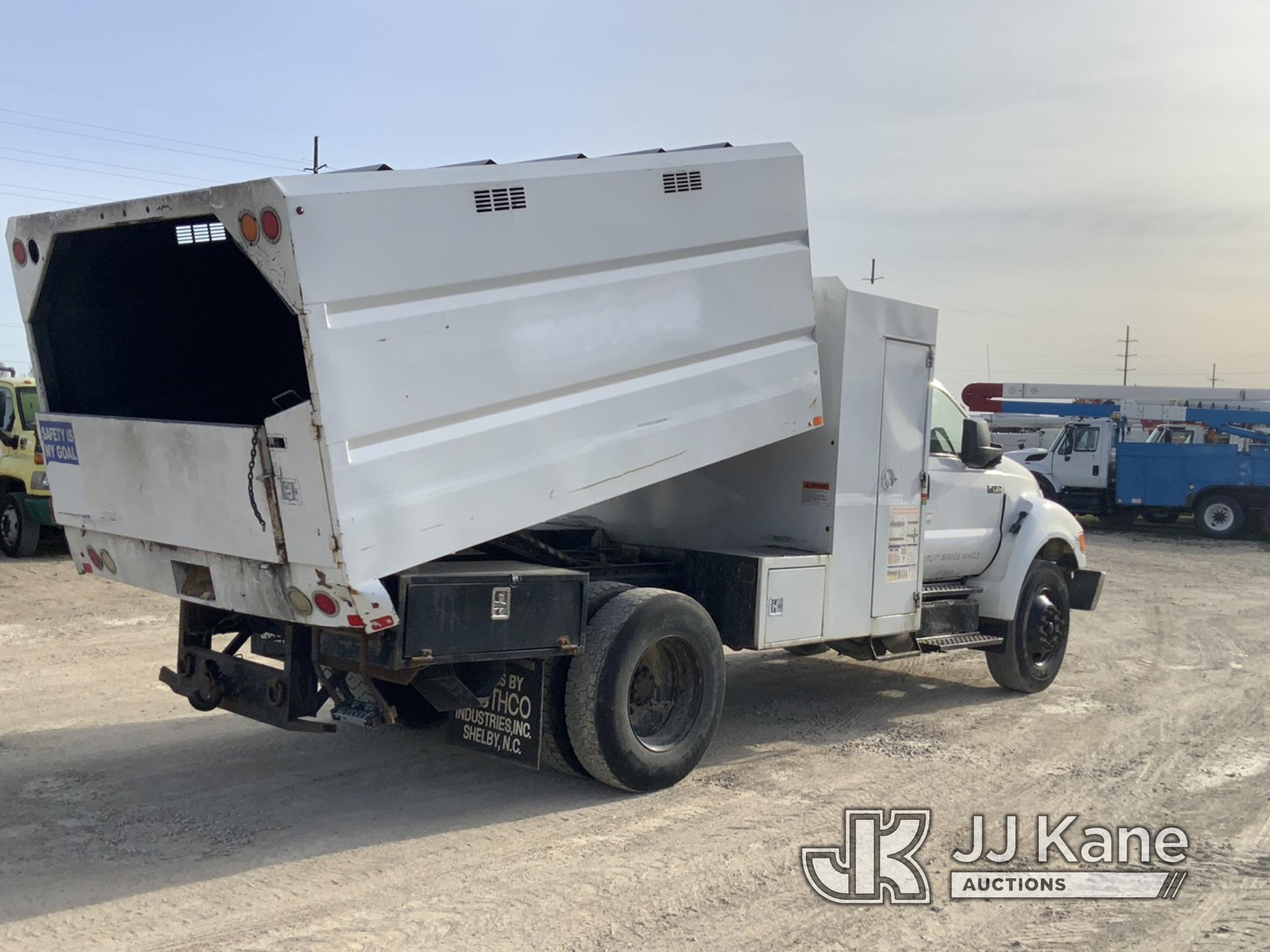 (Charlotte, MI) 2013 Ford F750 Chipper Dump Truck Runs, Moves, Dump Operates, Check Engine Light, Se