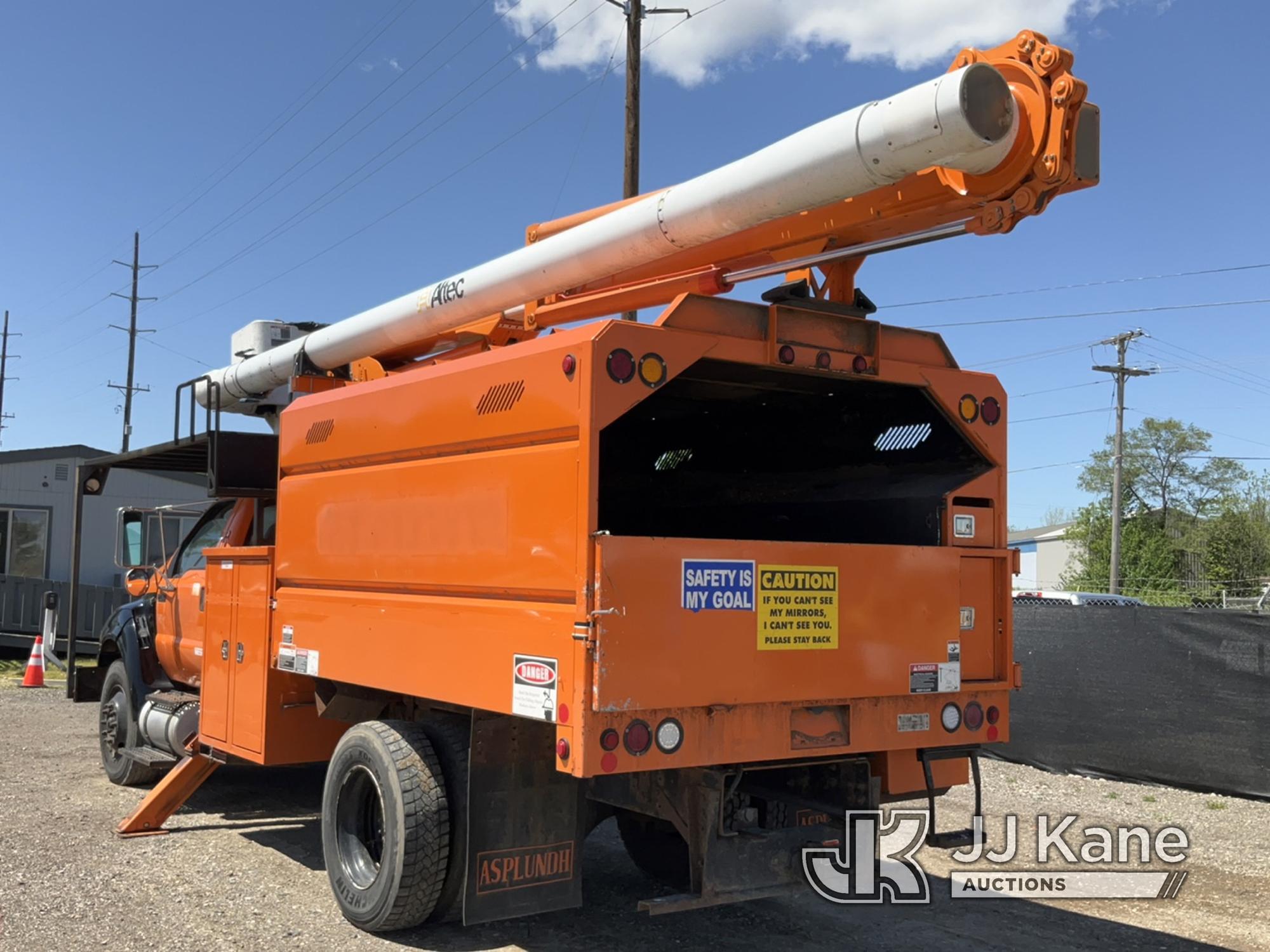 (Charlotte, MI) Altec LR756, Over-Center Bucket Truck mounted behind cab on 2013 Ford F750 Chipper D