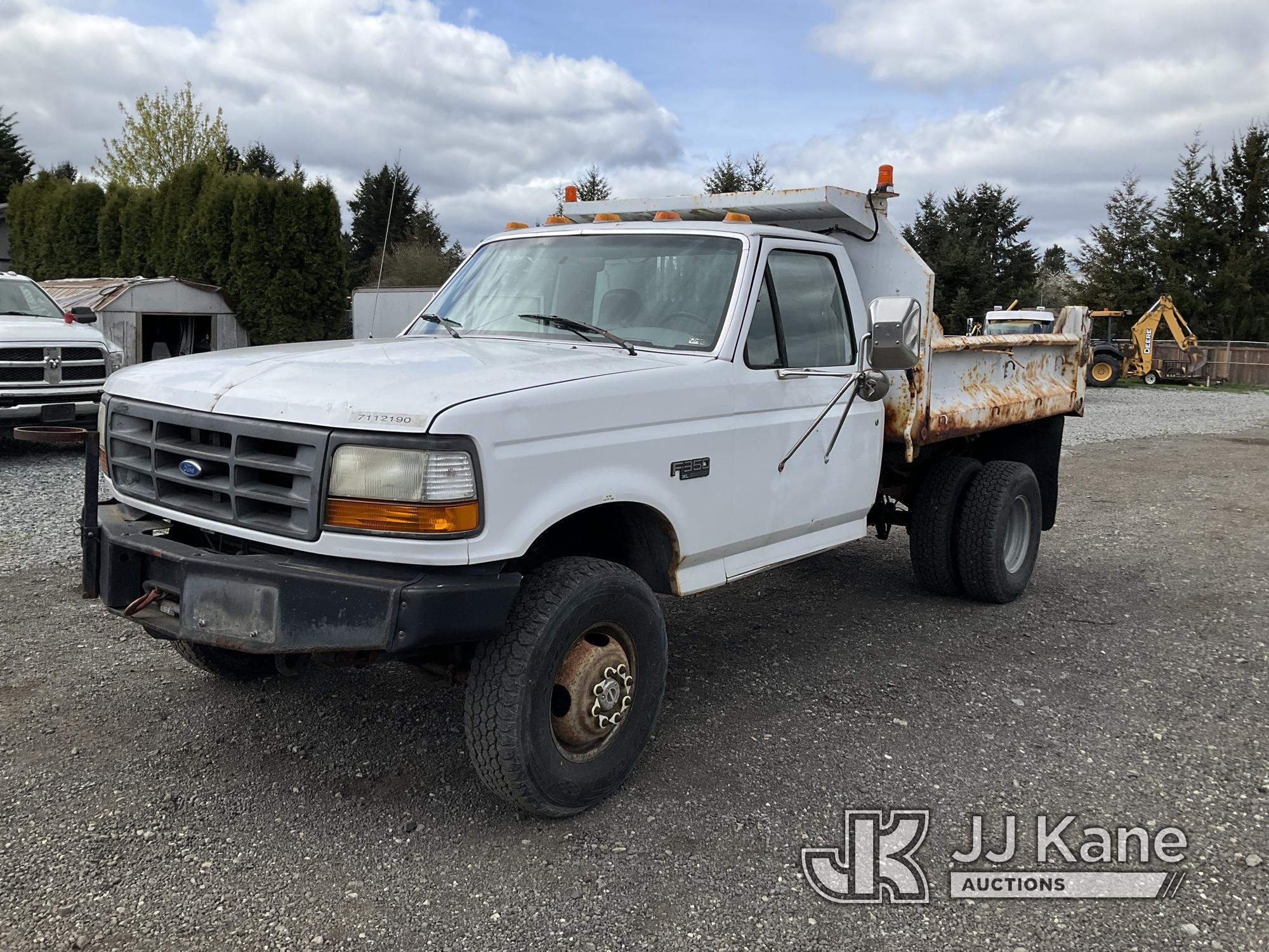 (Tacoma, WA) 1997 Ford F350 4x4 Dump Truck Runs, Moves & Dump Operates) (Rust Damage