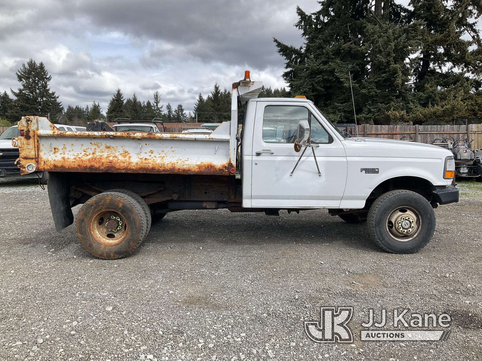 (Tacoma, WA) 1997 Ford F350 4x4 Dump Truck Runs, Moves & Dump Operates) (Rust Damage