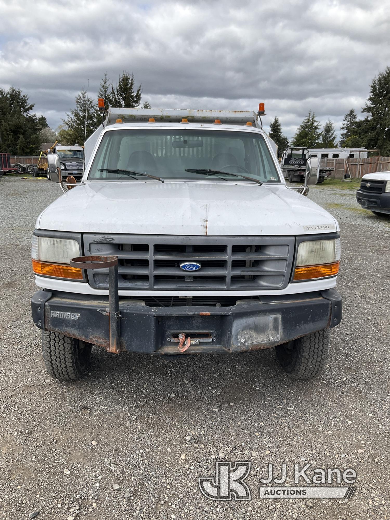 (Tacoma, WA) 1997 Ford F350 4x4 Dump Truck Runs, Moves & Dump Operates) (Rust Damage