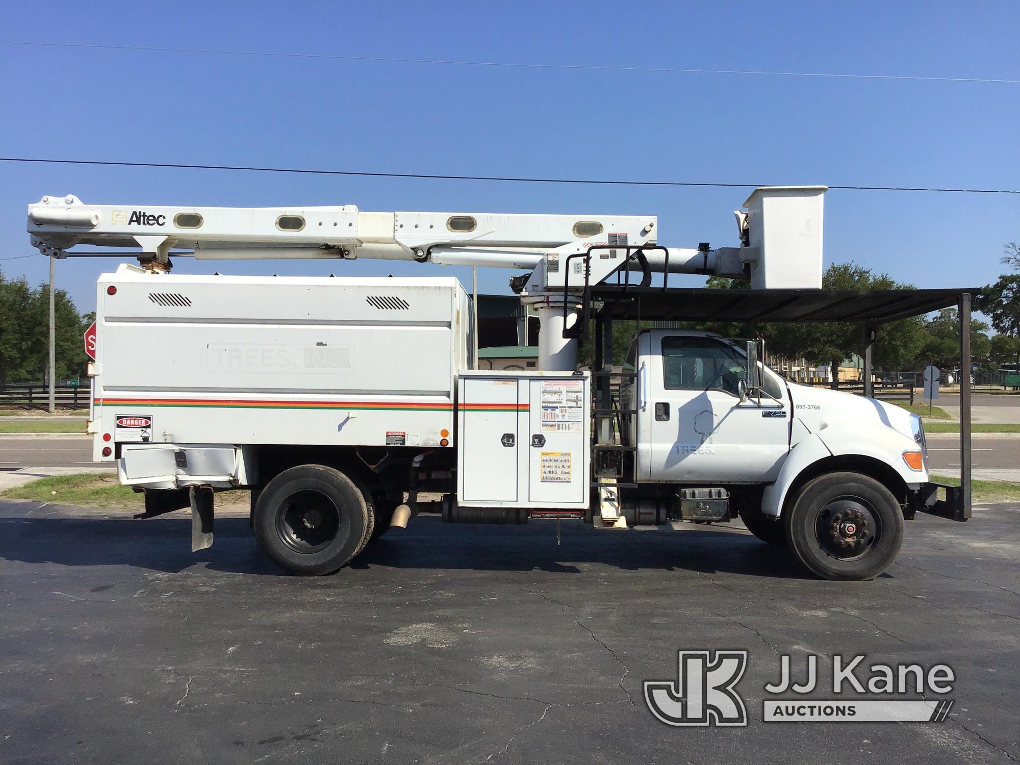 (Ocala, FL) Altec LR756, Over-Center Bucket Truck mounted behind cab on 2013 Ford F750 Chipper Dump