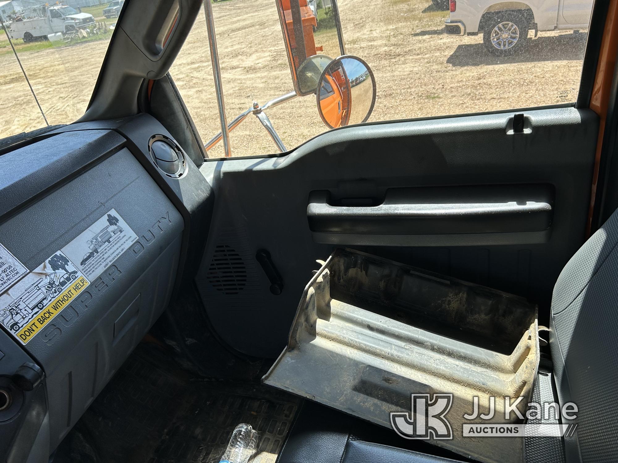 (Byram, MS) Altec LR756, Over-Center Bucket Truck mounted behind cab on 2013 Ford F750 Chipper Dump