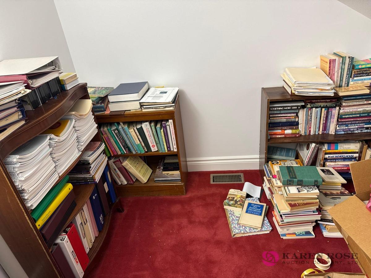 upstairs far left lot of books and shelves