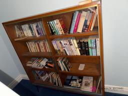 basement glass door bookshelf with books