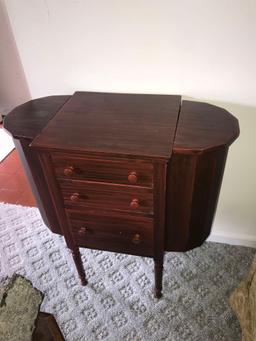 Antique sewing cabinet