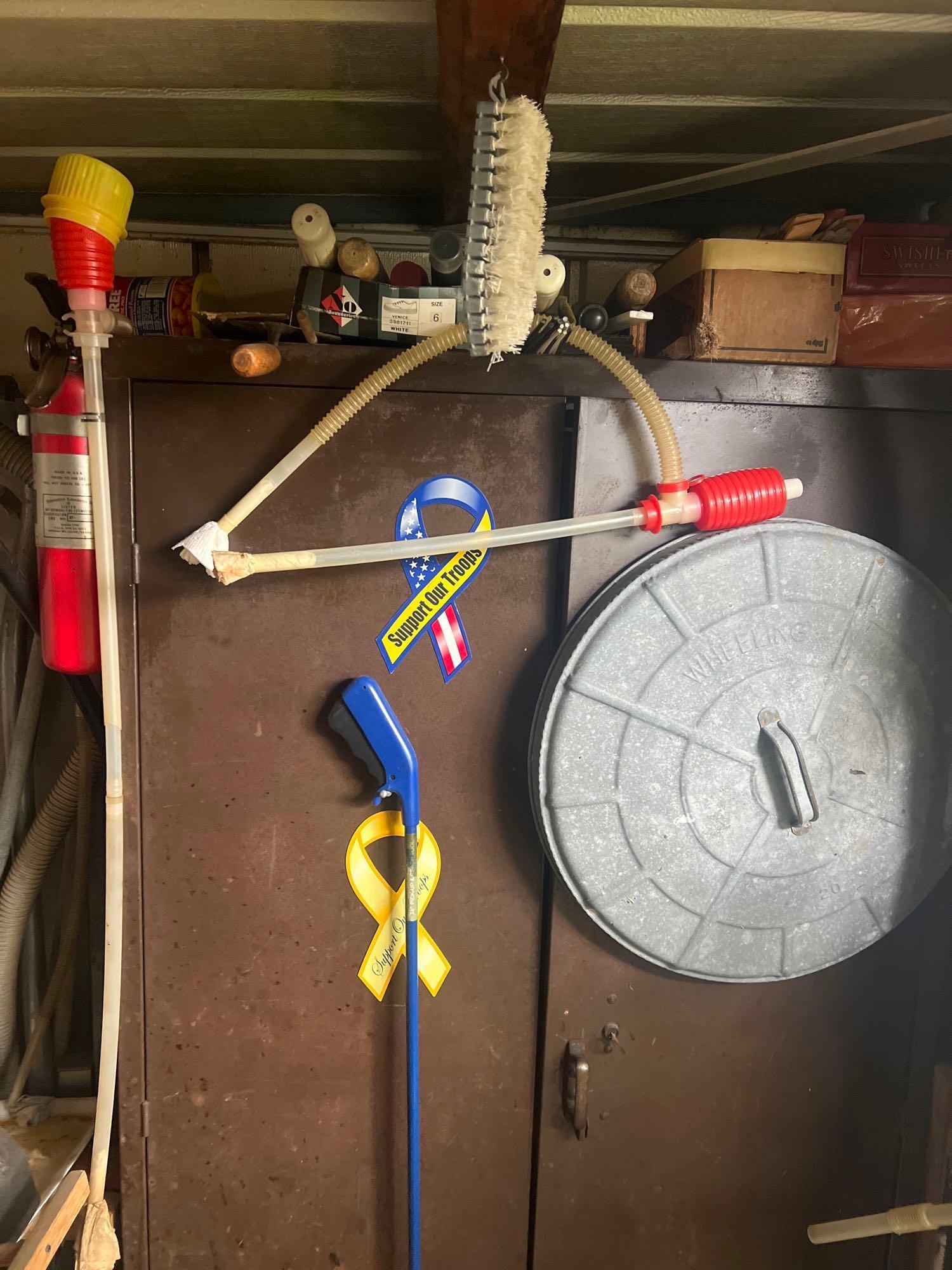 Metal cabinet with contents in shed