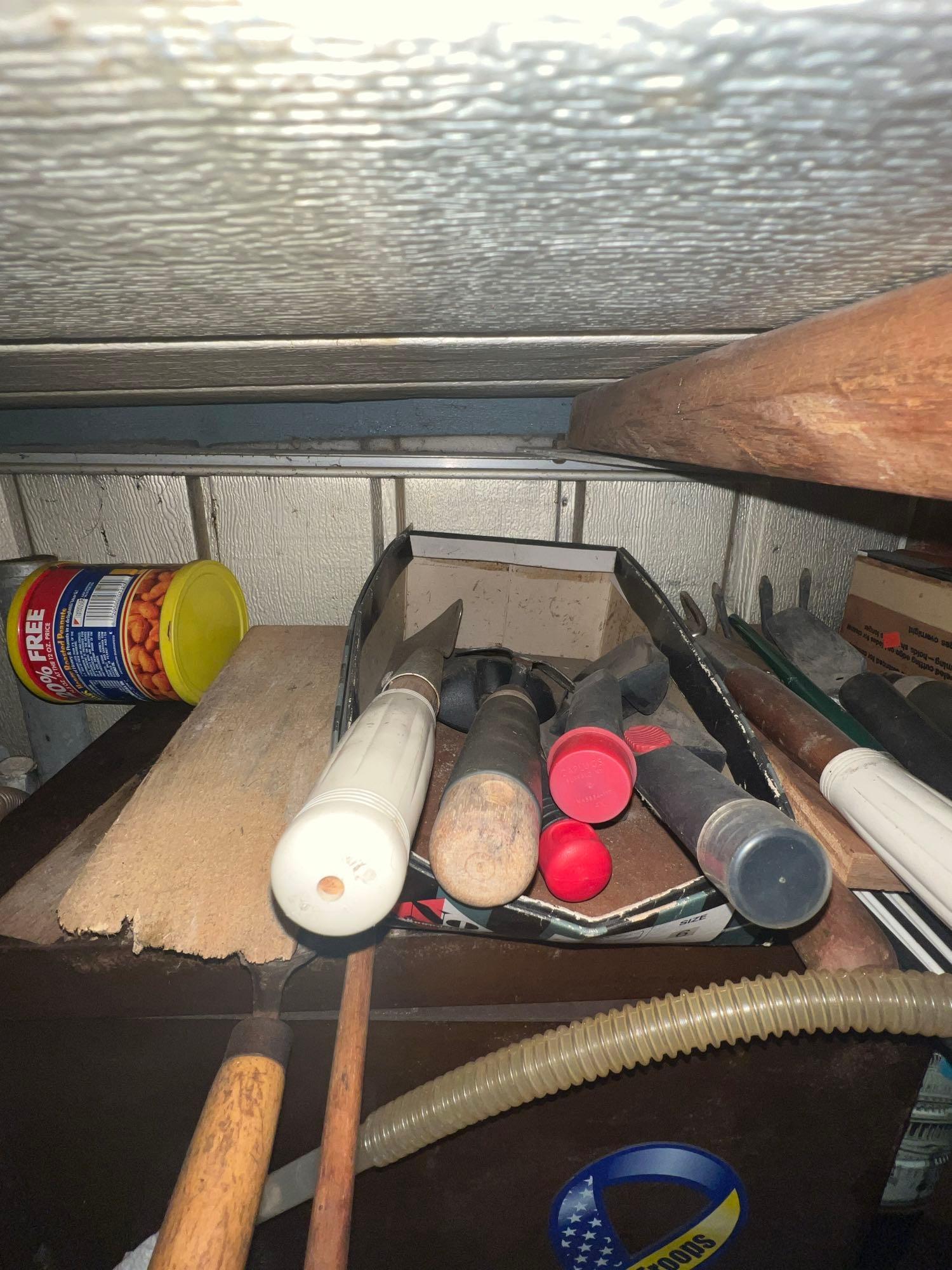 Metal cabinet with contents in shed