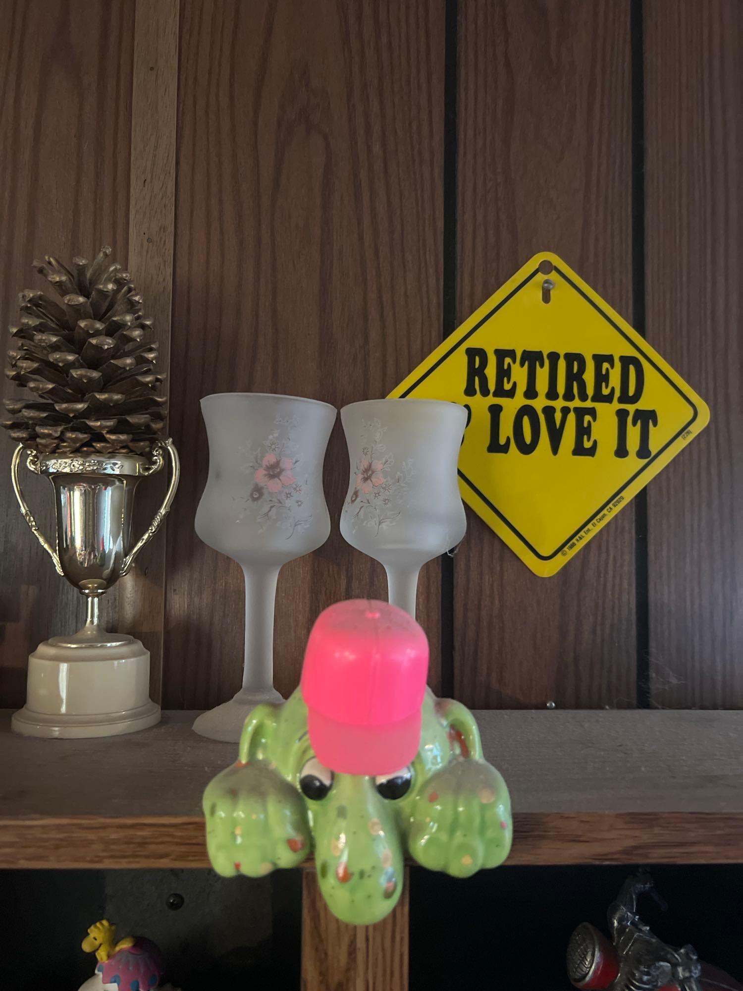 Shelf with collectors cars and motorcycles