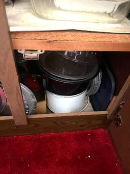 contents of kitchen cabinet - baking dishes and more
