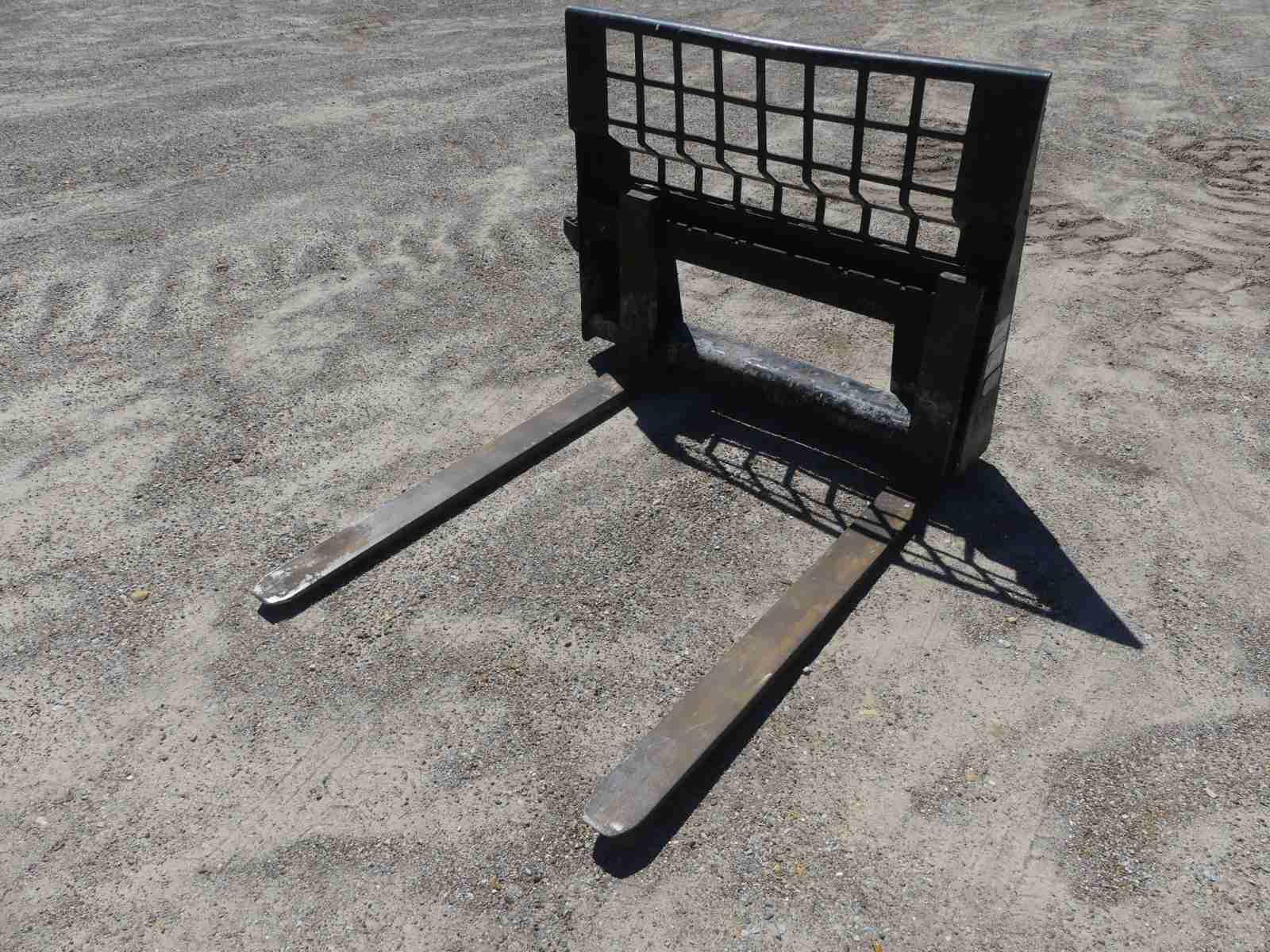 Set of Cat Pallet Forks for Skid Steer