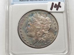 Morgan $ 1884S NNC AU58+ rainbow toned