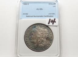 Morgan $ 1884S NNC AU58+ rainbow toned