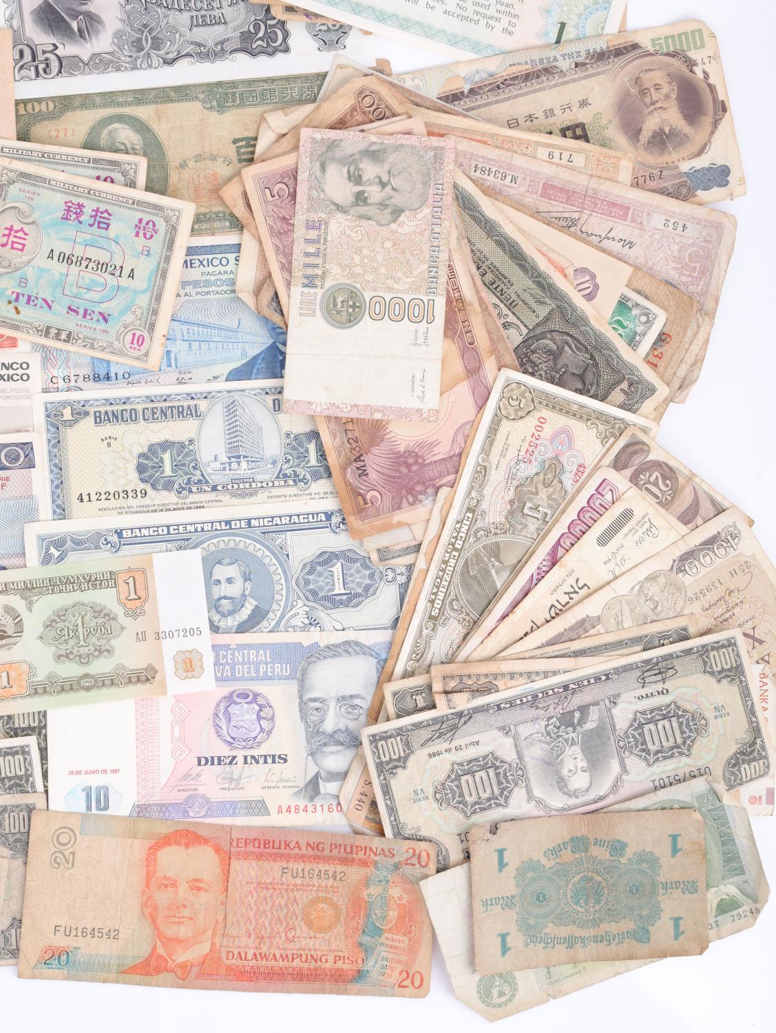 LARGE LOT OF CURRENCY FROM AROUND THE WORLD