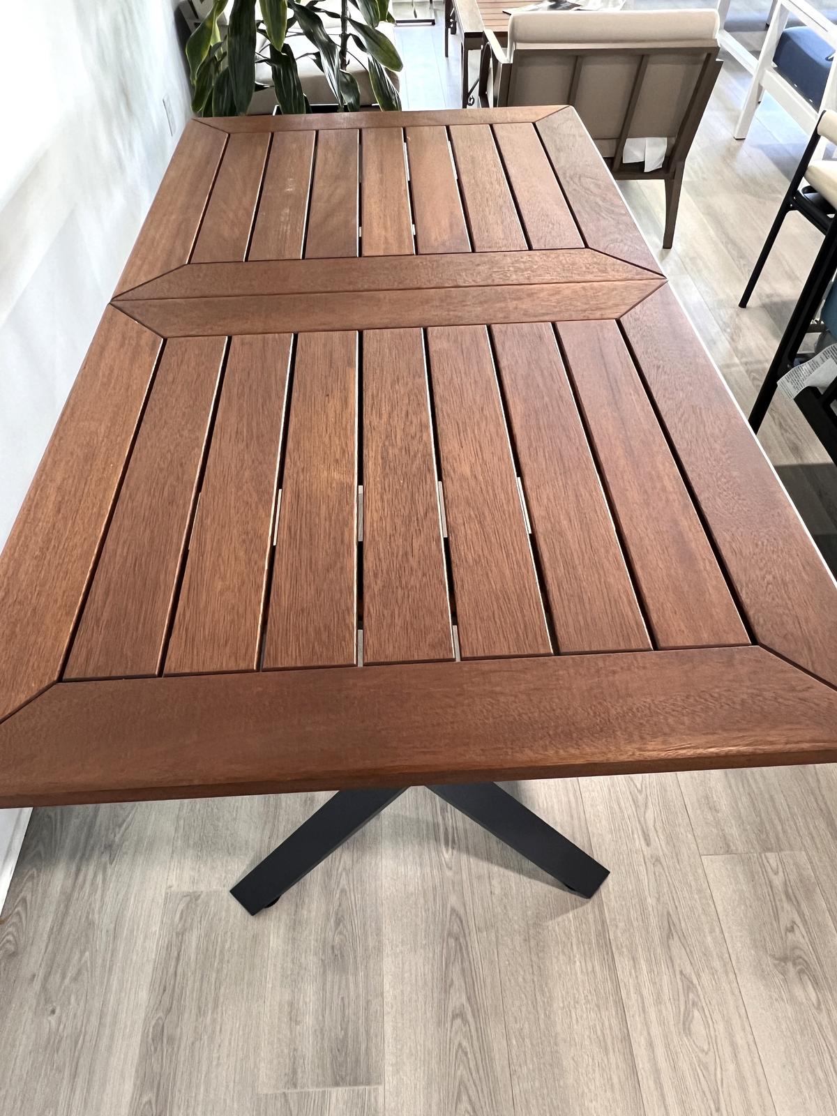 Dining Room Table with Built In Leaf, Powder Coated Frame Finished in  Black with a Teak Table  Top.