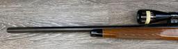 REMINGTON MODEL 700 .243 WIN CALIBER BOLT-ACTION RIFLE W/SCOPE.