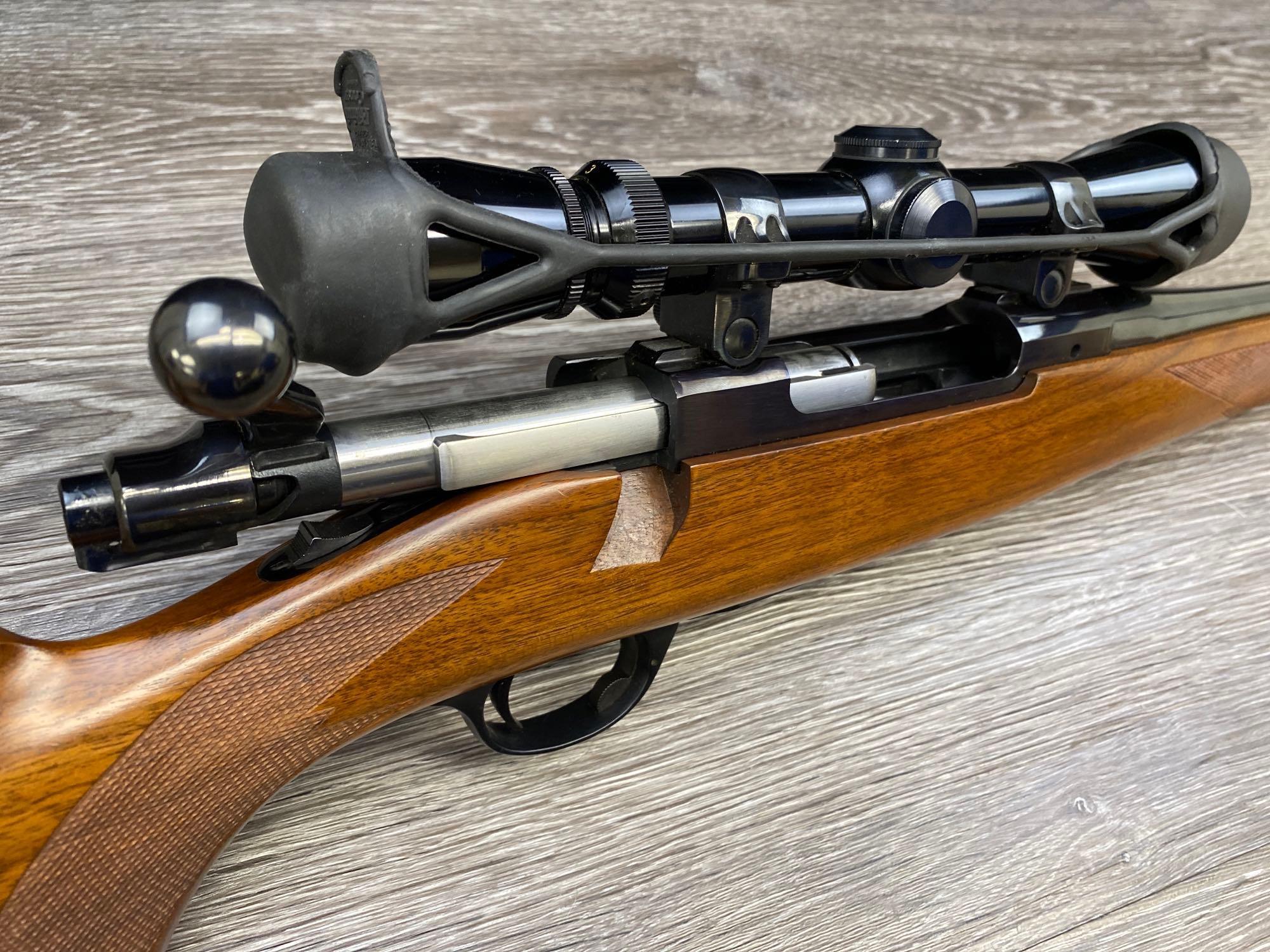 RUGER MODEL M77 .270 WIN CALIBER BOLT-ACTION RIFLE W/LEUPOLD ADJUSTABLE VARI-X 3X9 COMPACT SCOPE.