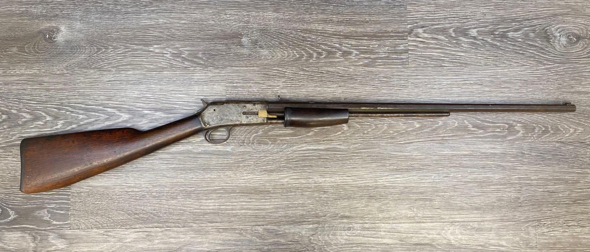 COLT LIGHTNING SLIDE ACTION RIFLE .22 CALIBER, LAST PAT'D DATE ON BARREL FEB. 22, 1887.