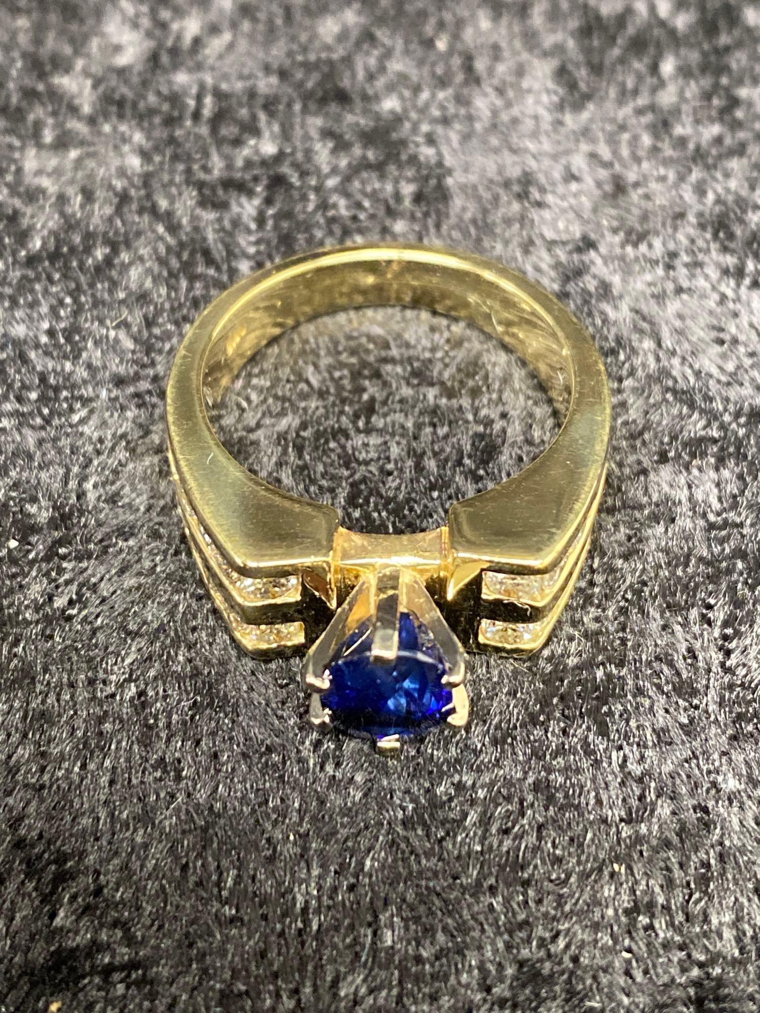 One Beautiful Ring Set with Fine Blue Sapphire and Side Diamonds in 14k Yellow Gold