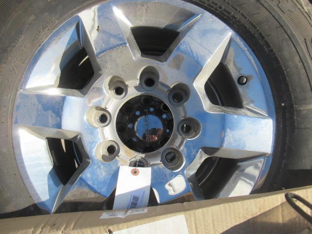 (3) LT265/70R18 GOODYEAR TIRES ON 8 LUG STEEL WHEELS, (2) SEMI FENDER FLARES, & ASSORTED BRACKETS