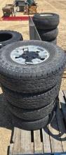 (4) 265/75R15 TIRES ON CHEVY 6 BOLT RIMS