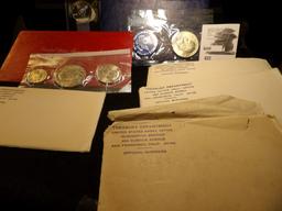 1976 Silver Bicentennial Uncirculated Three-piece Set; 1973 S Silver Uncirculated Eisenhower Dollar;